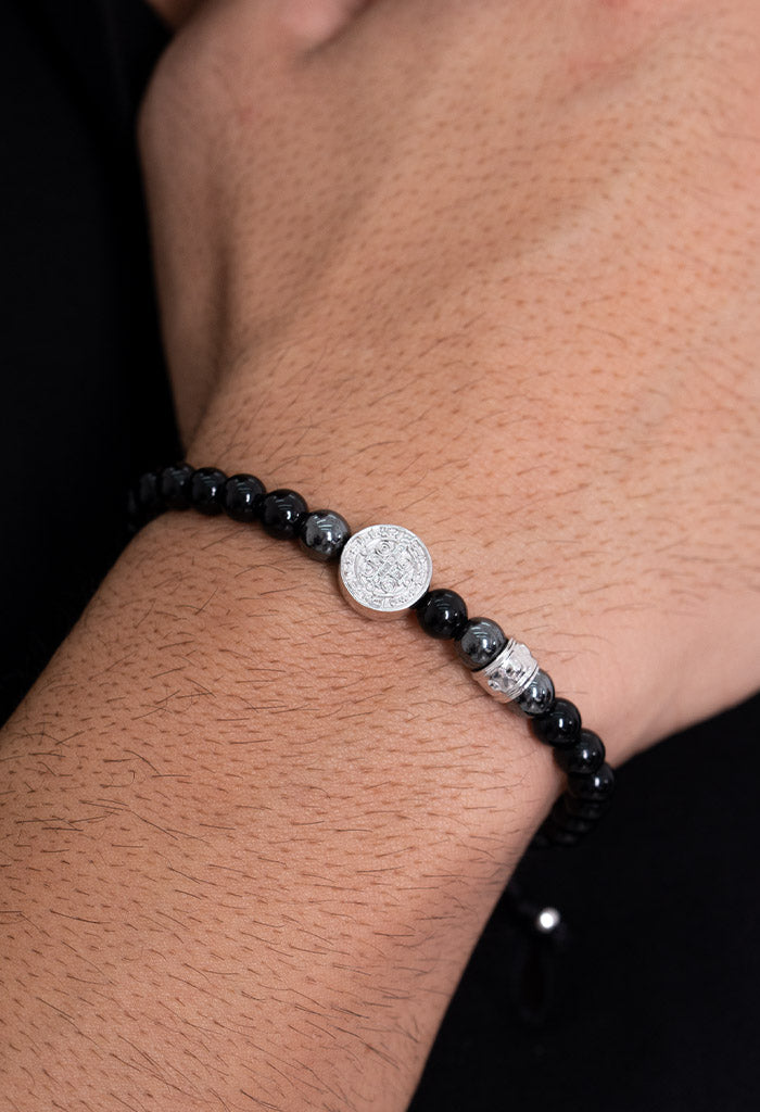 Pulsera San Benito Ónix Hematita Separador Baño Rodio
